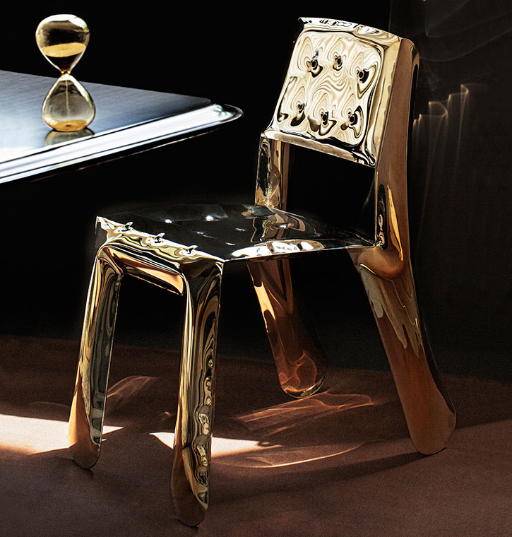 CHIPPENSTEEL chair in Flamed Gold finish.