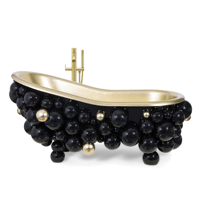 Newton is an outstanding moment of design inspiration. This bathtub features a curved lip style shape, a timeless detail that conveys comfort, made out of gold-painted casted iron, revealing its entire golden interior. 