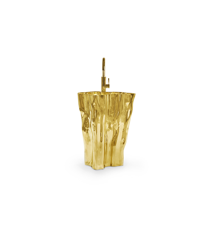 Eden is a modern pedestal sink inspired by the shape of a tree stump. This amazingly striking and organically shaped freestanding is a wonder made of casted aluminum. Its built-in sink has a special rough-textured surface that is reminiscent of beautiful and harmoniously unique growth rings, awarding any luxury bathroom a special glow.