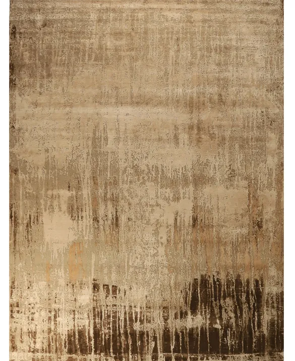 Foto di un tappeto dal disegno astratto nei toni del marrone e sabbia sand