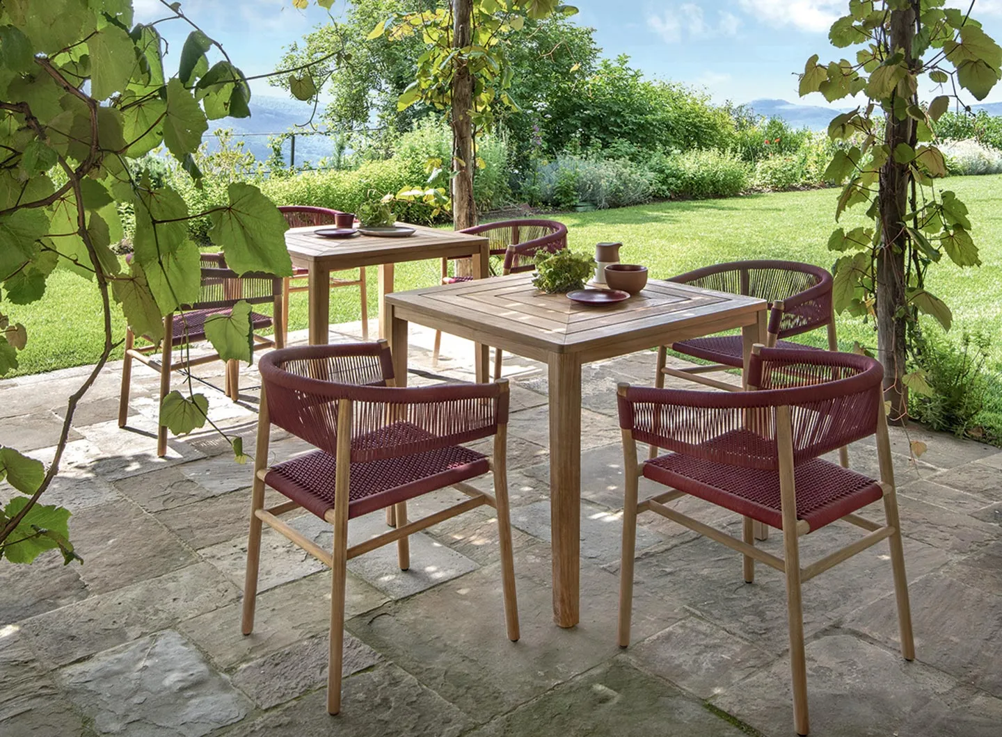 Ethimo - Kilt dining armchair in teak and round rope Ruby Wine.