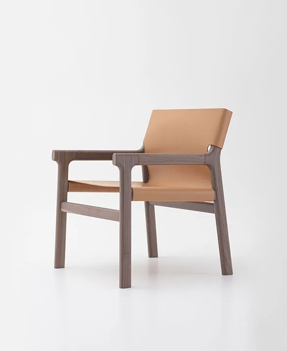 armchair in wood and hard leather designed by Philippe Tabet per Pianca