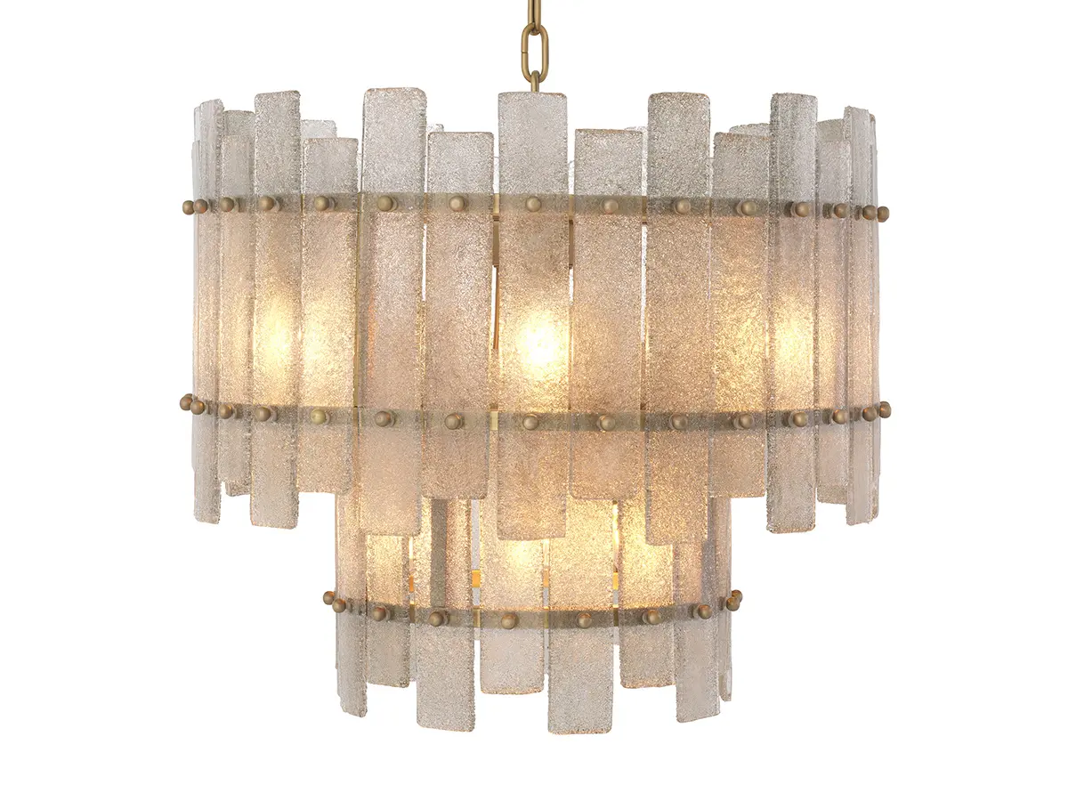 Chandelier Caprera - Chandelier Caprera presents a sophisticated contemporary twist on a classic design. Finished in antique brass, it features 10 lights in a tapered, two-tiered design. The drops are made of hand-blown glass with a roughened backside, which produces a startling effect when the lamp is lit.