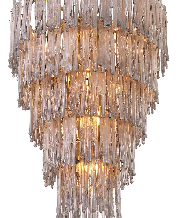 Chandelier Saint Roch - Crown your hallway, living room or dining space with Chandelier Saint Roch L. This fabulous tapered ceiling pendant with light brushed brass finish has five tiers with smoke glass decorations. Due to a special treatment, the smoke glass has a dripping effect, making the crystals look like icicles. Create a cluster of large and small Saint Roch chandeliers for a magical atmosphere.