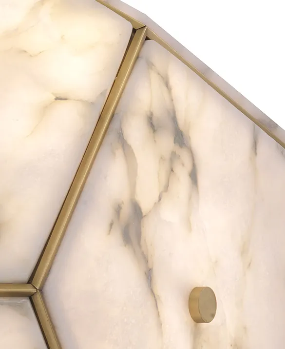 Lantern Gallo - Handcrafted by skilled artisans, Lantern Gallo stands out for its geometric design. Bring contemporary elegance to your home with this eye-catching lantern, featuring an antique brass finish frame and pentagon shaped slabs of alabaster.