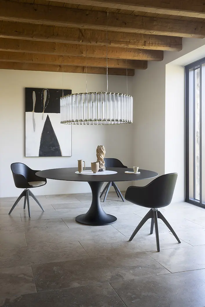 Manzù table, designed by Pio Manzù | New Lady, designed by Paolo Rizzatto