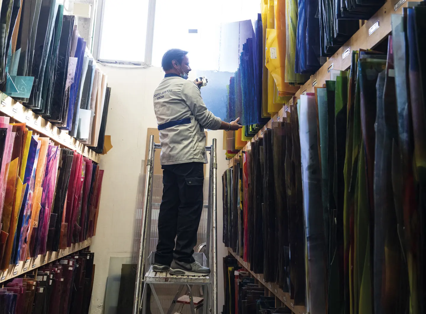 Sample warehouse of blown glass sheets of different colors 