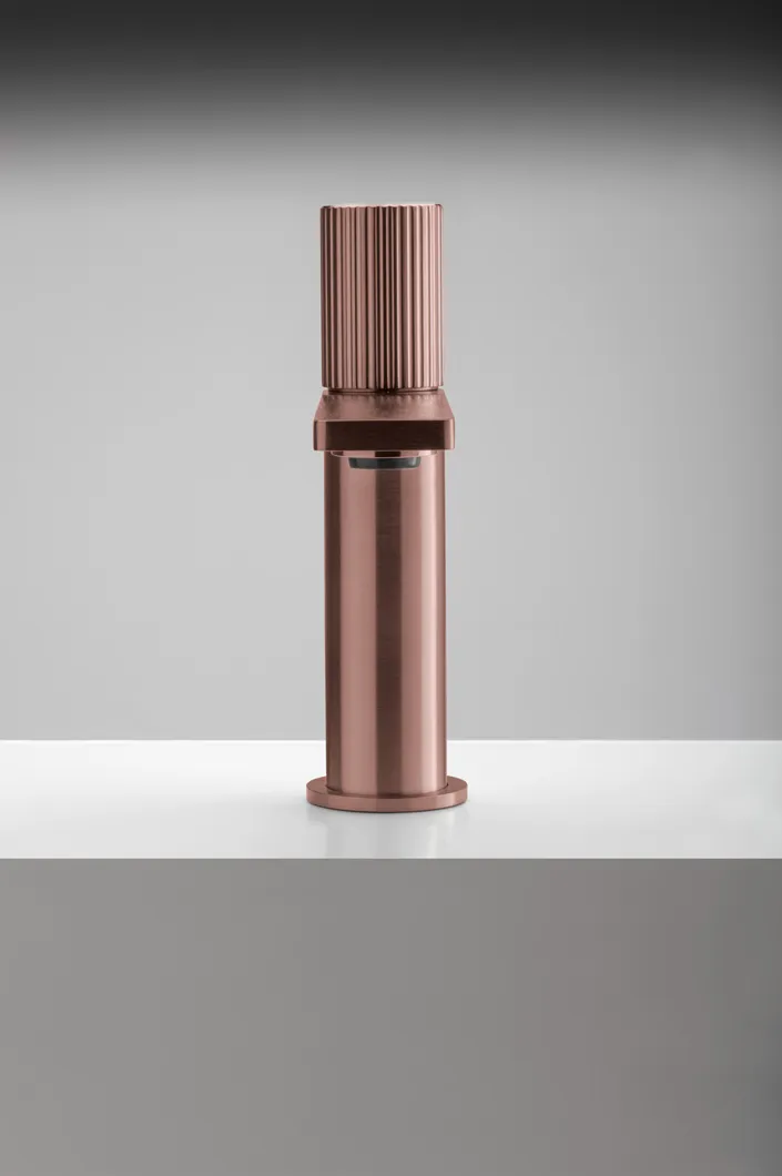Q316 Copper finish washbasin mixer with cylindrical knob chiseled with vertical lines