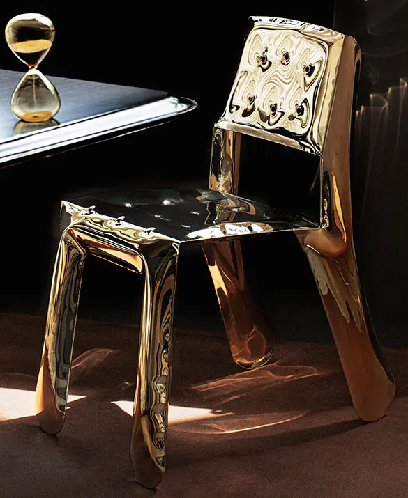 CHIPPENSTEEL chair in Flamed Gold finish.