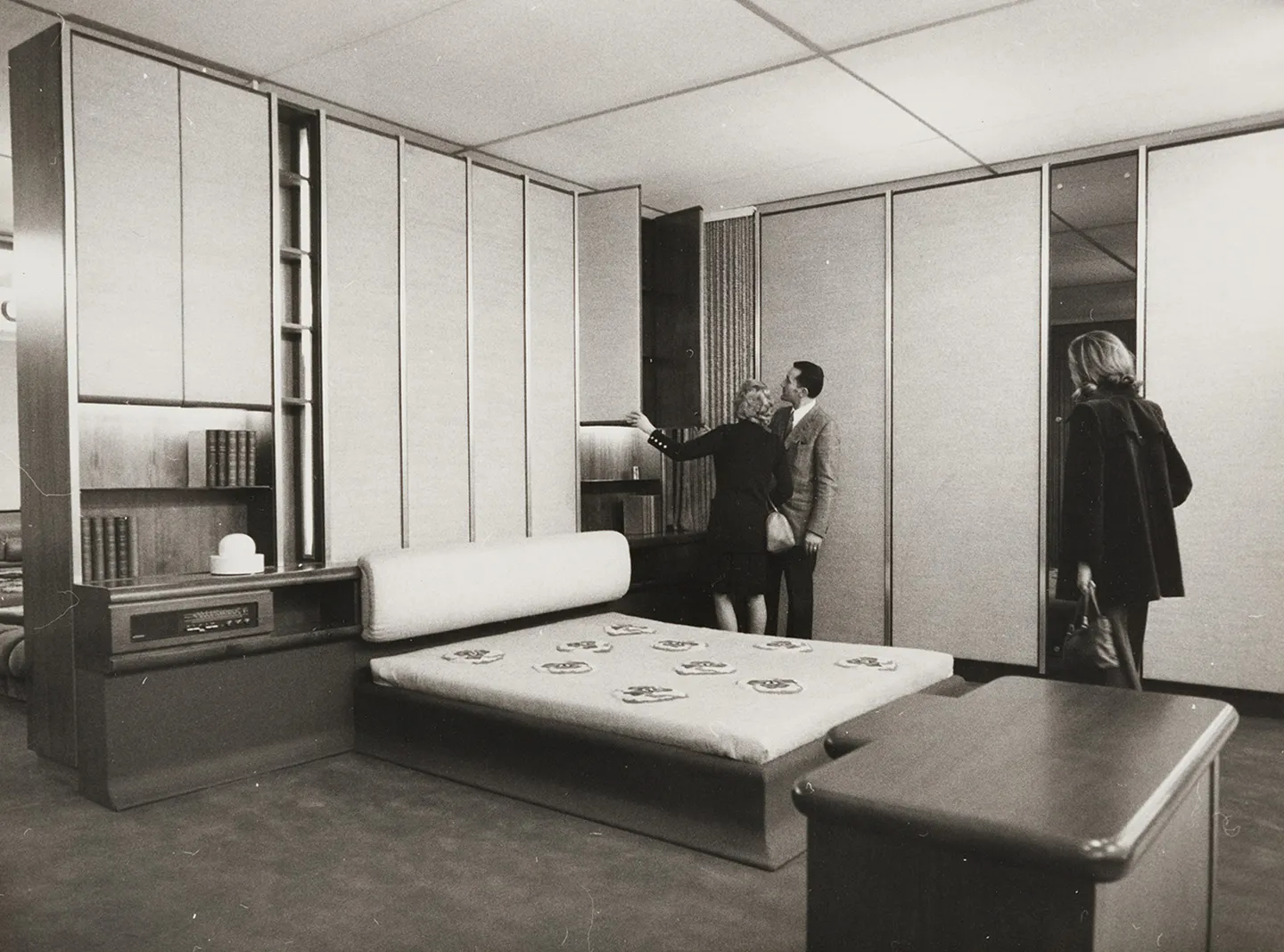 Bedrooms furnished with functional built-in wardrobes in the furniture pavilion at the Milan Trade Fair in 1974