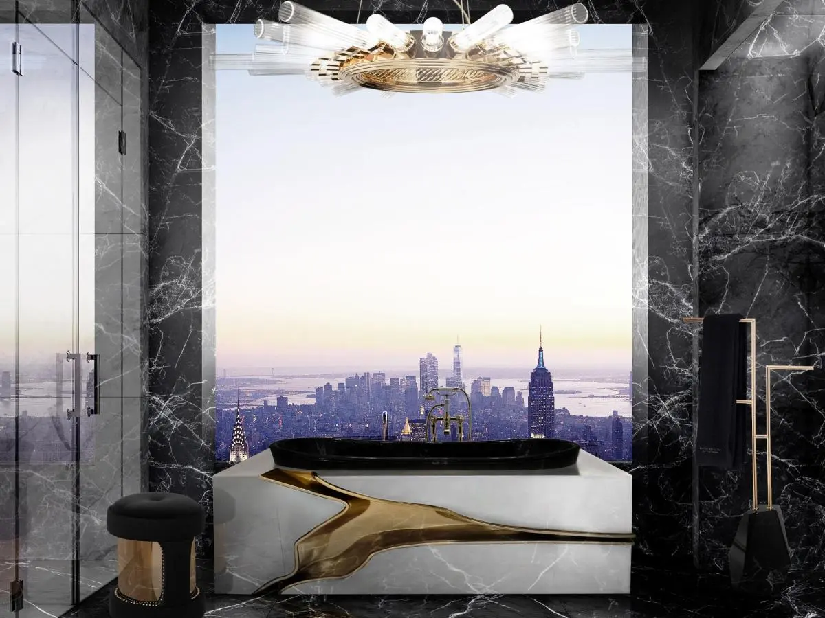 Modern Bathroom iluminated by a stunning view, with a gold bathtub, a chandelier and a bench.
