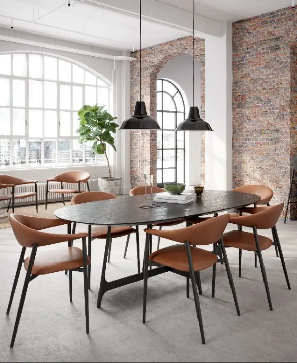 DAN-FORM's ROVER armchairs around the OOID table in a New Yorker home