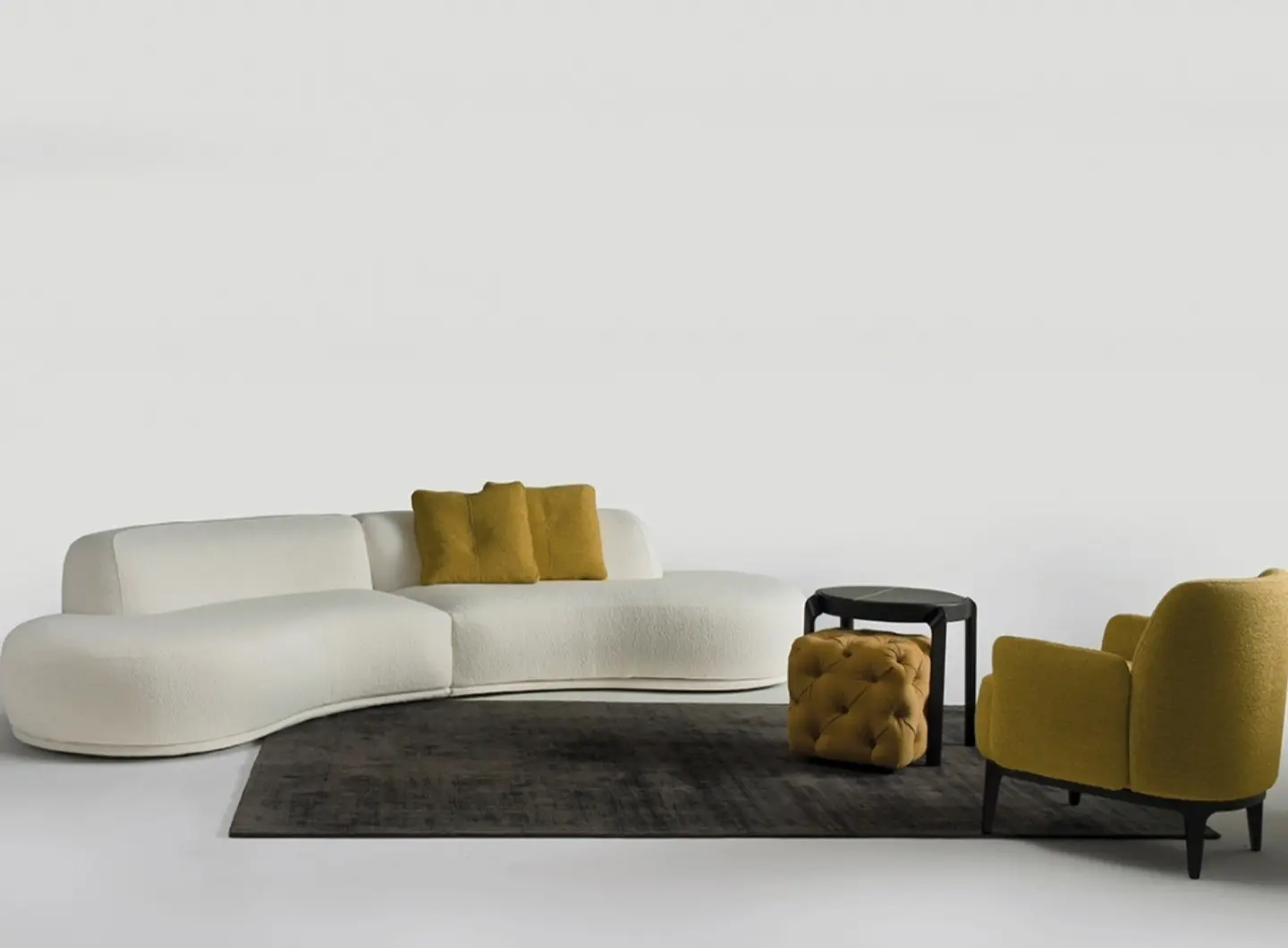 Collection Bagutta, armchair Margot, coffee table Tape and ottoman Tresor.