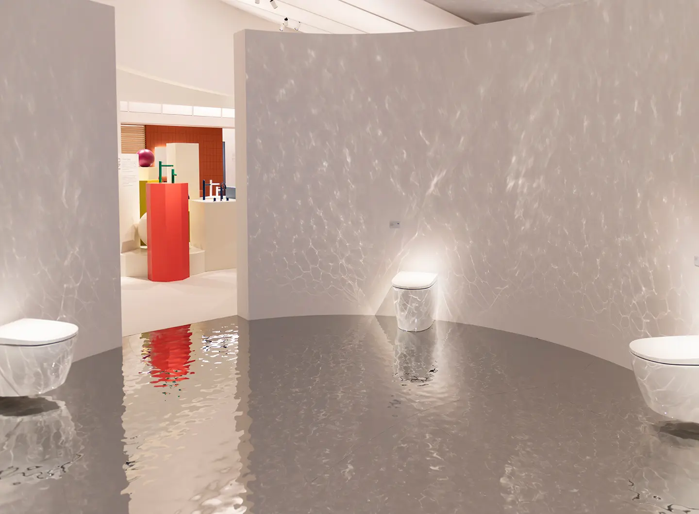 3 white toilets arranged along two curved walls, delimiting a circular area, illuminated by imitating the reflection of water