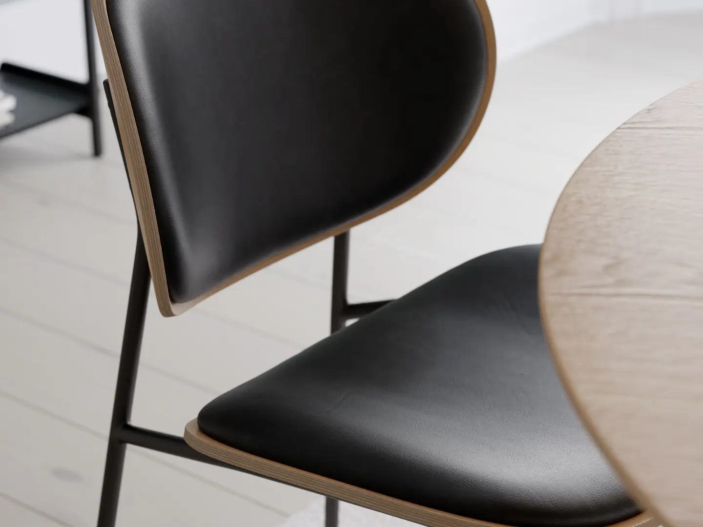 CLEMENTINA_chair_whitewashed_oak_w._raven_black_faux_leather_around_OOID_round_table_whitewashed_oak.jpg