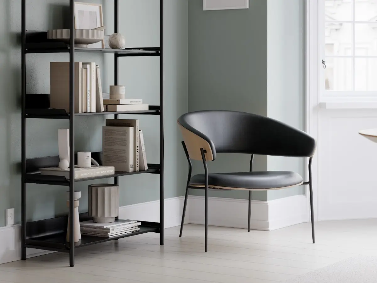DAN-FORM's CRIB lounge chair in oak veneer with vintage black artificial leather sear