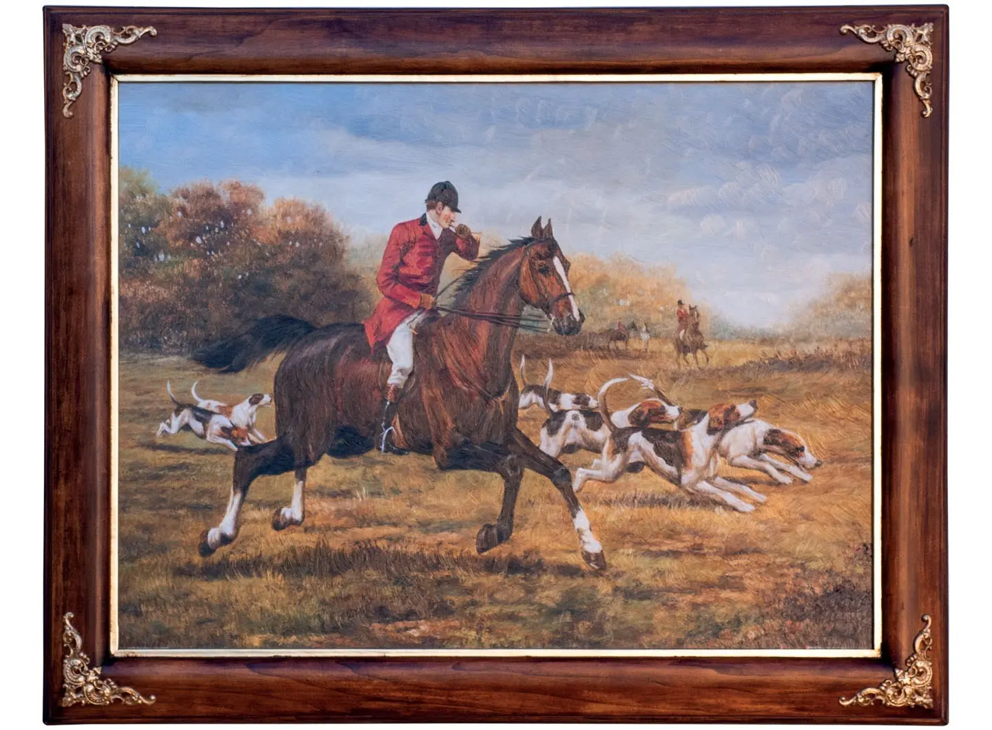 Quadro con scena tradizionale di caccia alla volpe inglese con cavalieri a cavallo in movimento nella campagna. L'immagine è racchiusa in una cornice in legno massello color noce con decorazioni dorate agli angoli. L'insieme trasmette eleganza e tradizione.
