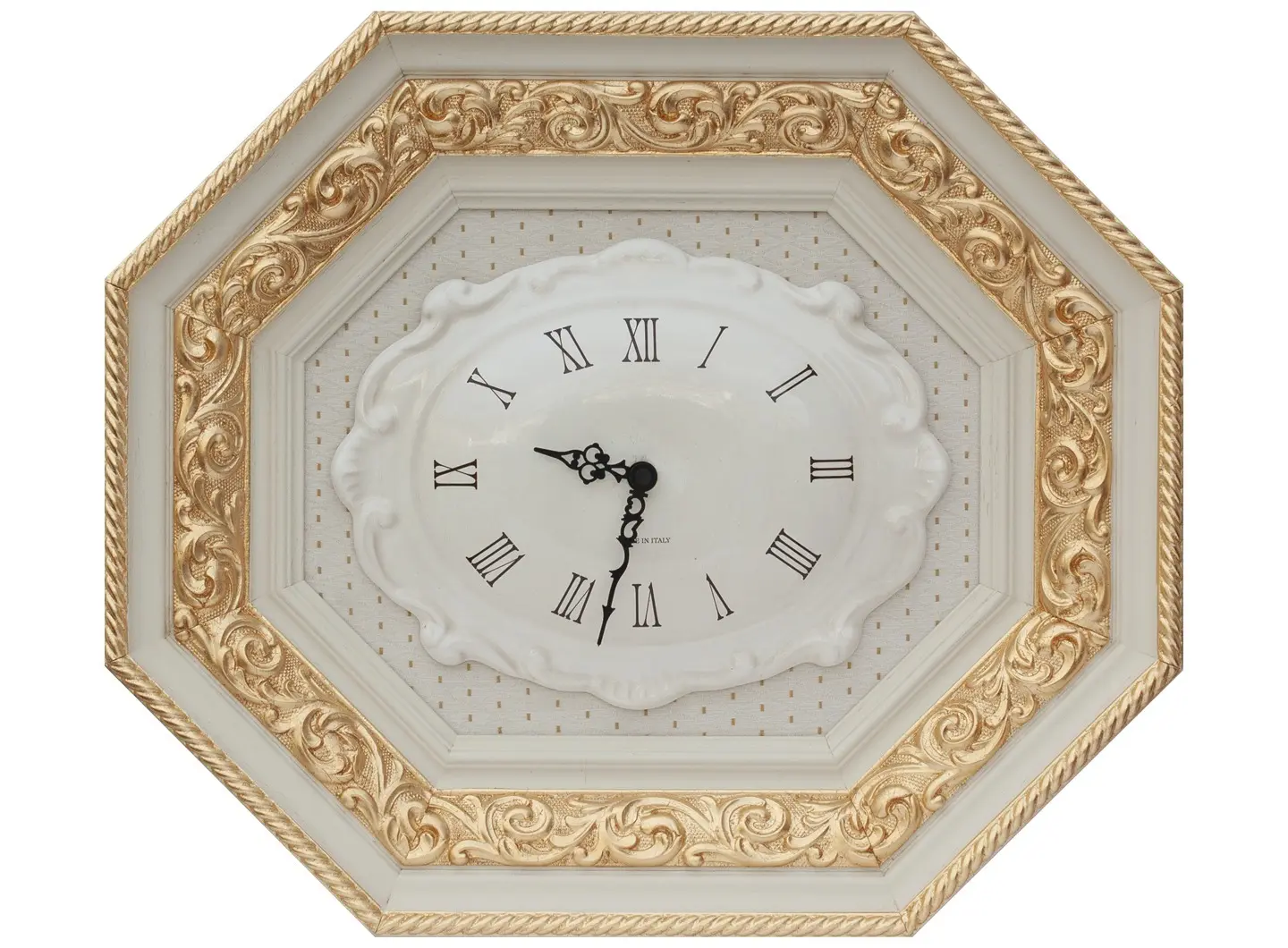 Orologio da parete con cornice ottagonale in legno massello e quadrante in ceramica ovale.