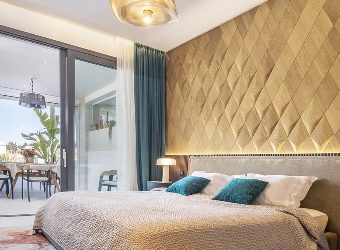 Luxury bedroom featuring a large accent wall with 3D oak wood panels in a diamond pattern, LED backlighting, and teal decor accents.