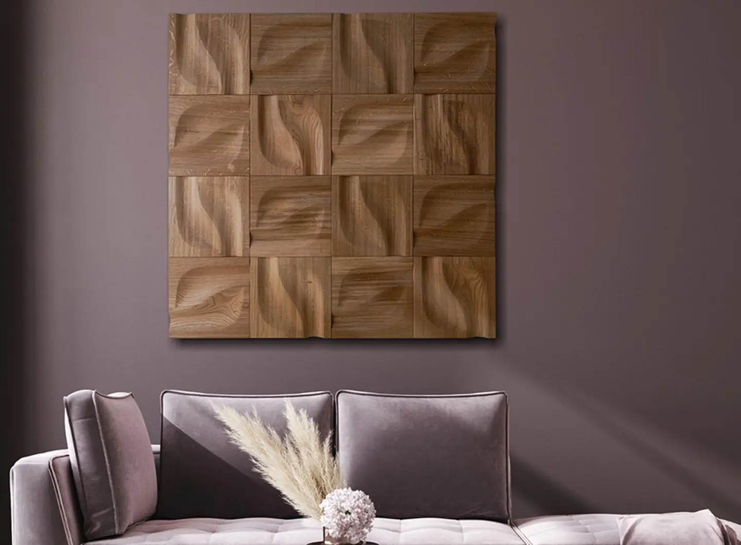 Artistic wall decor featuring 3D oak wood panels in a Leaf pattern arranged as a square wall art above a purple sofa.