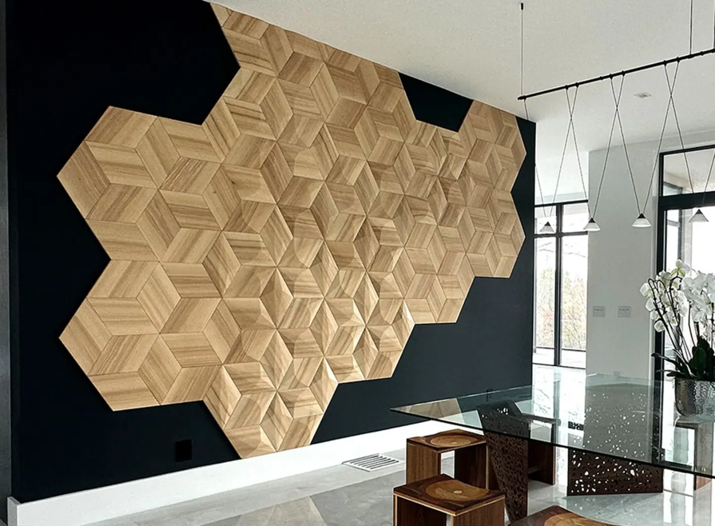 Modern dining room featuring an artistic 3D oak wood panel installation in a honeycomb shape on a black accent wall.