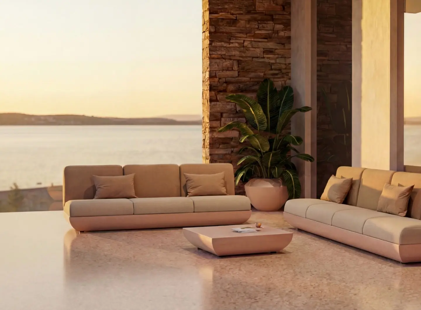 VITORIA modular outdoor sofas by GANSK on a sea-view terrace at sunset, paired with a sculptural low coffee table.