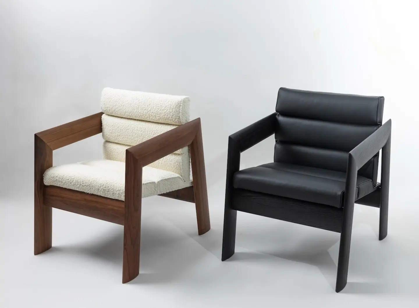 Lounge chairs in walnut and blackened ash