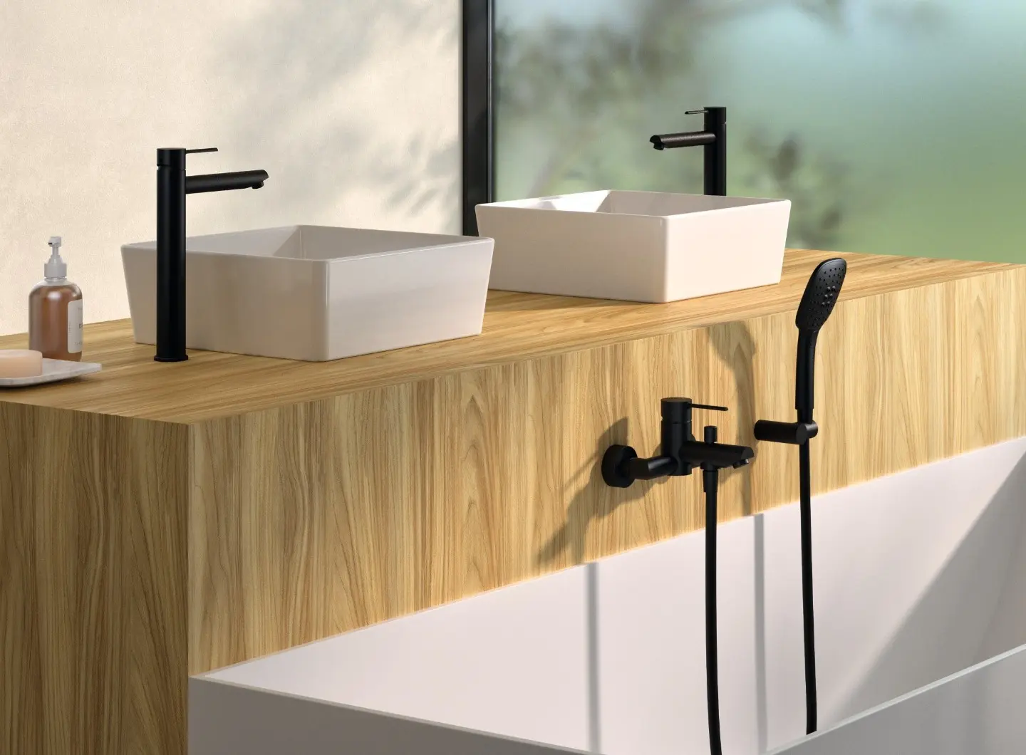 Single-lever basin mixer with a high spout and a bath-shower set with shower fittings, from the Mamma Mia collection by ramonsoler in a matt black finish.