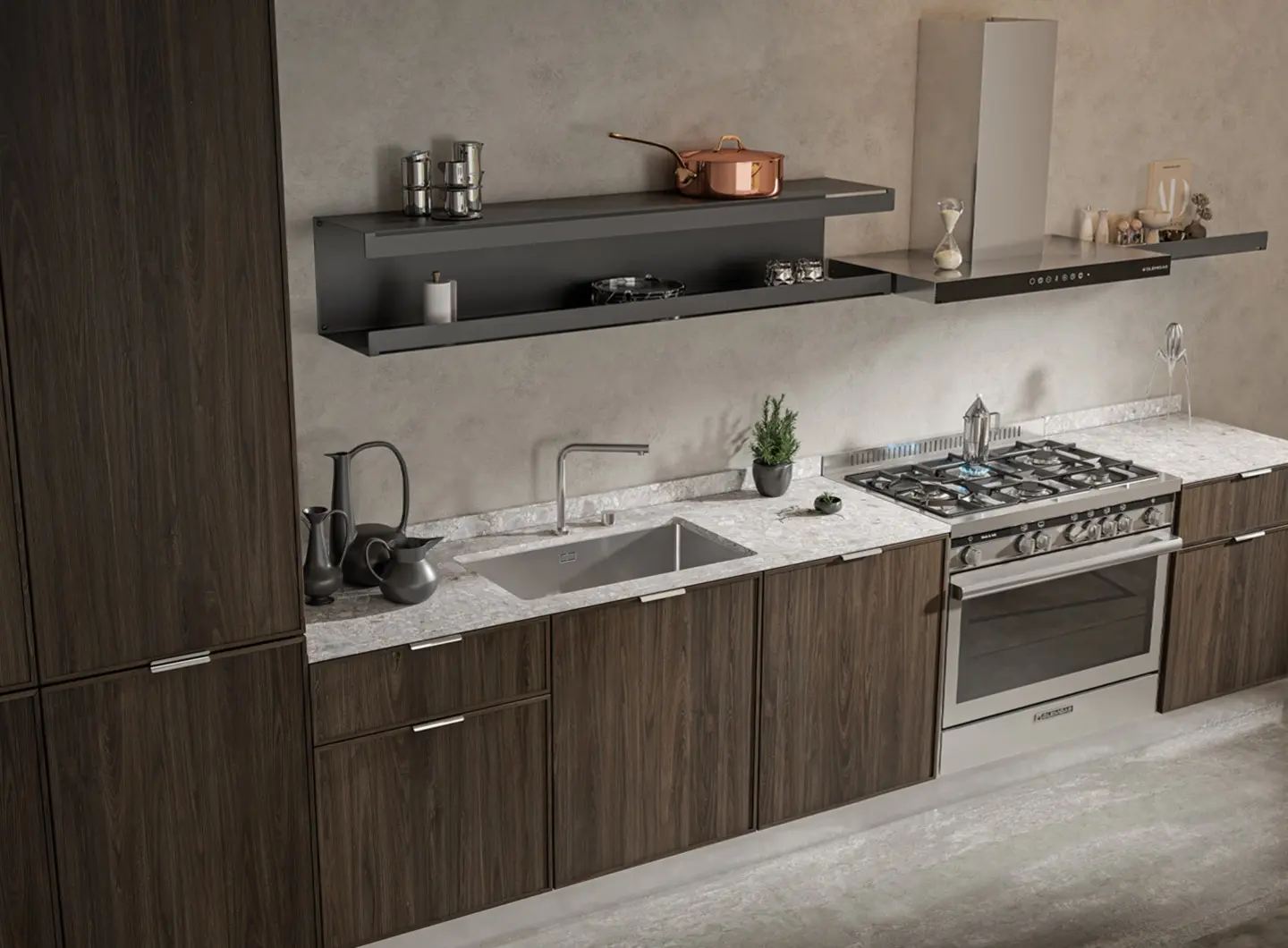 A modern kitchen with an industrial design, featuring dark wood cabinetry with visible grain. The countertop is made of gray veined marble and hosts an XL stainless steel sink and a freestanding Specialista ST stainless steel cooker with a 5-burner hob. Above the countertop, a long minimalist black shelf and a NO•DROP stainless steel extractor hood with a sophisticated profile complete the space.