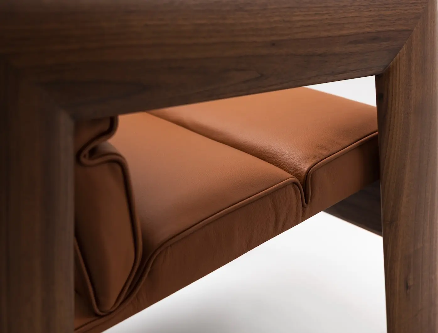 Lounge chair with brown leather upholstery