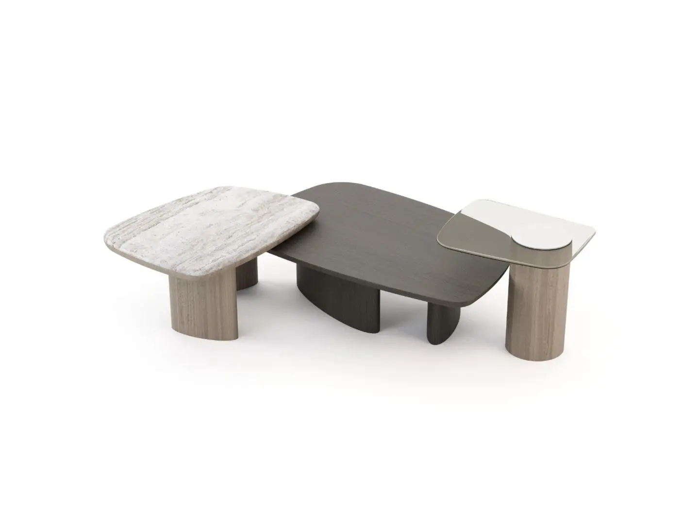 The Dolomites Coffee Table appears as a three‑part composition with rounded rectangular tops at different heights, including a light stone‑like surface, a dark wood surface, and a smaller glossy surface, each supported by cylindrical wooden legs with subtle brass details.