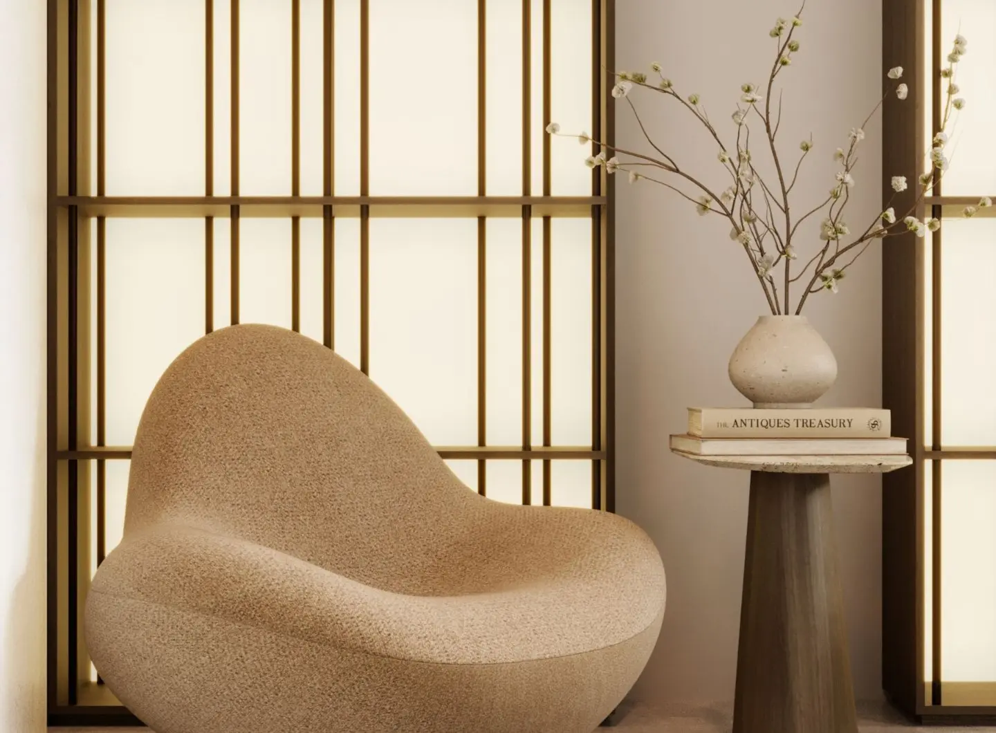 The Buren Bookcase is suggested through softly lit grid panels behind a sculptural beige lounge chair and a round side table holding a ceramic vase with blossoming branches, creating a serene corner where warm light and refined materials shape a calm, contemplative atmosphere.
