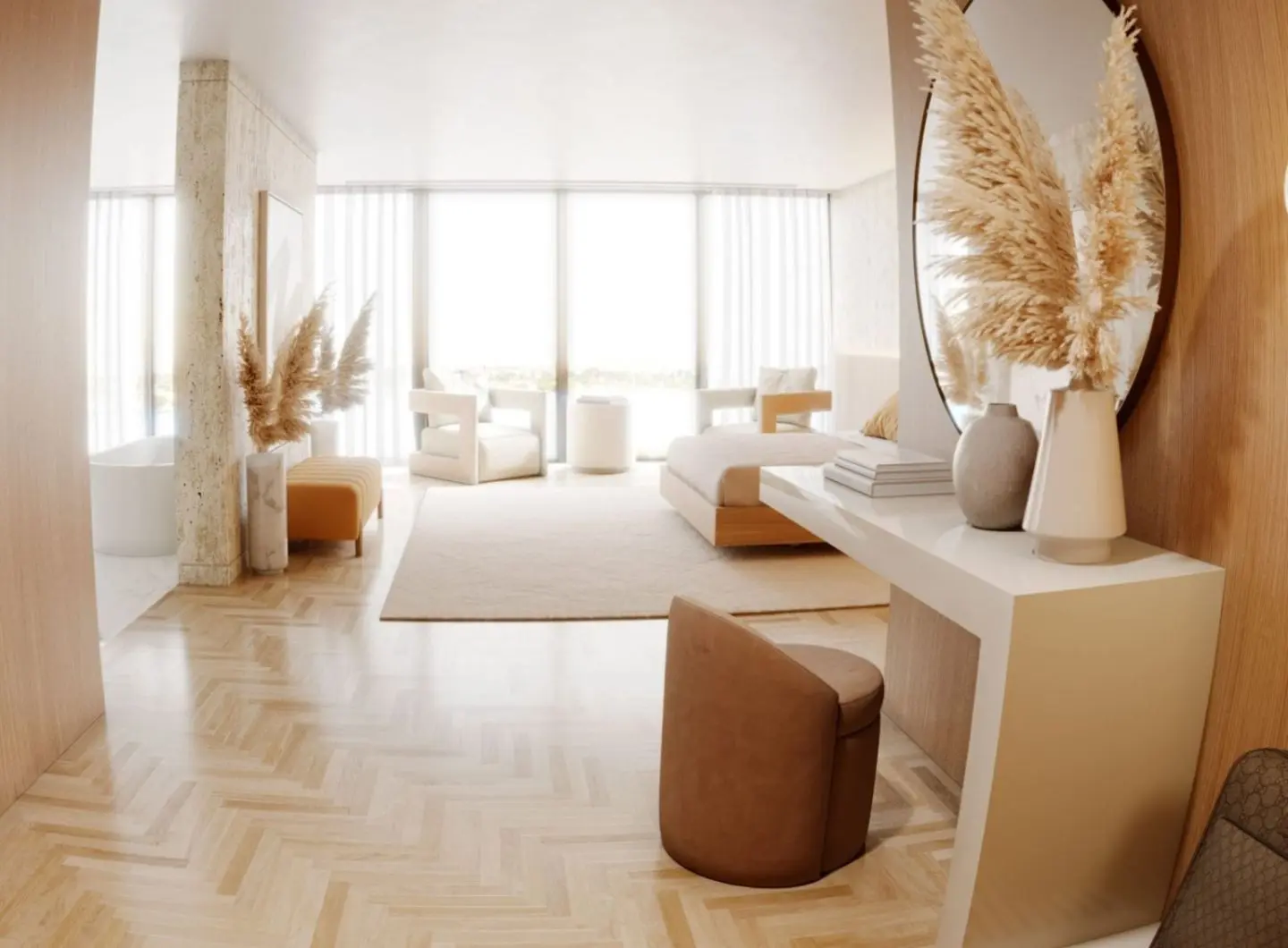 The Elis Stool is shown beside a curved white vanity in a warm, minimalist bedroom as a compact seat with gentle contours and soft tan upholstery, placed on a herringbone wood floor near decorative vases and natural light, creating a quiet moment of calm and refined simplicity within the space.