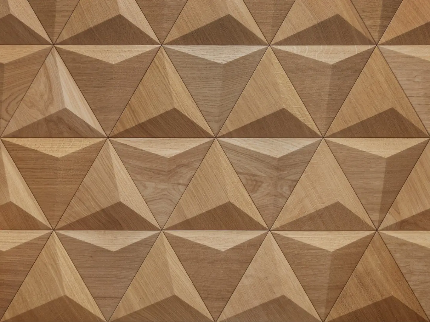 Close-up of 3D oak wood wall panels in a natural finish, featuring a pyramid triangle pattern and authentic wood grain.