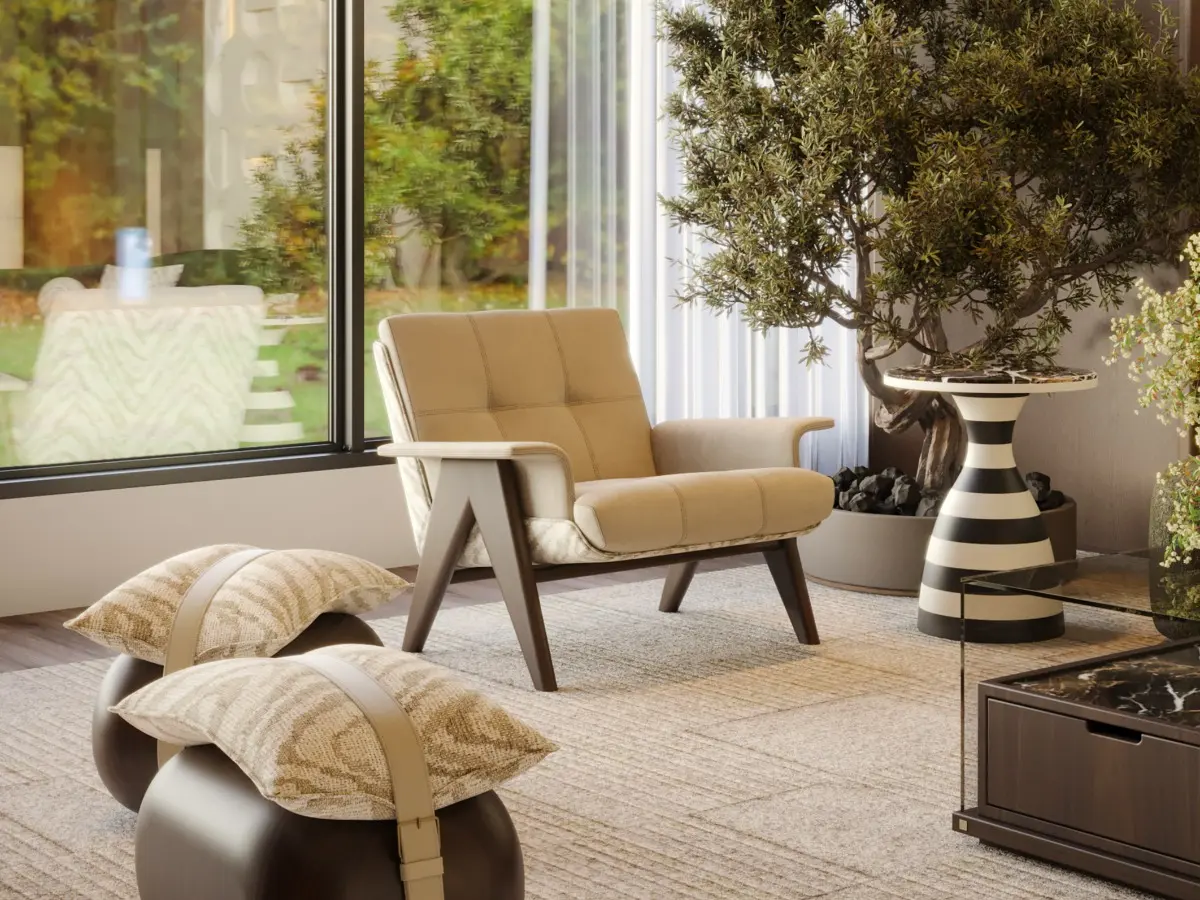 Harleton armchair by Muranti, fully upholstered including the arms, with an elegant contemporary silhouette and American walnut legs.