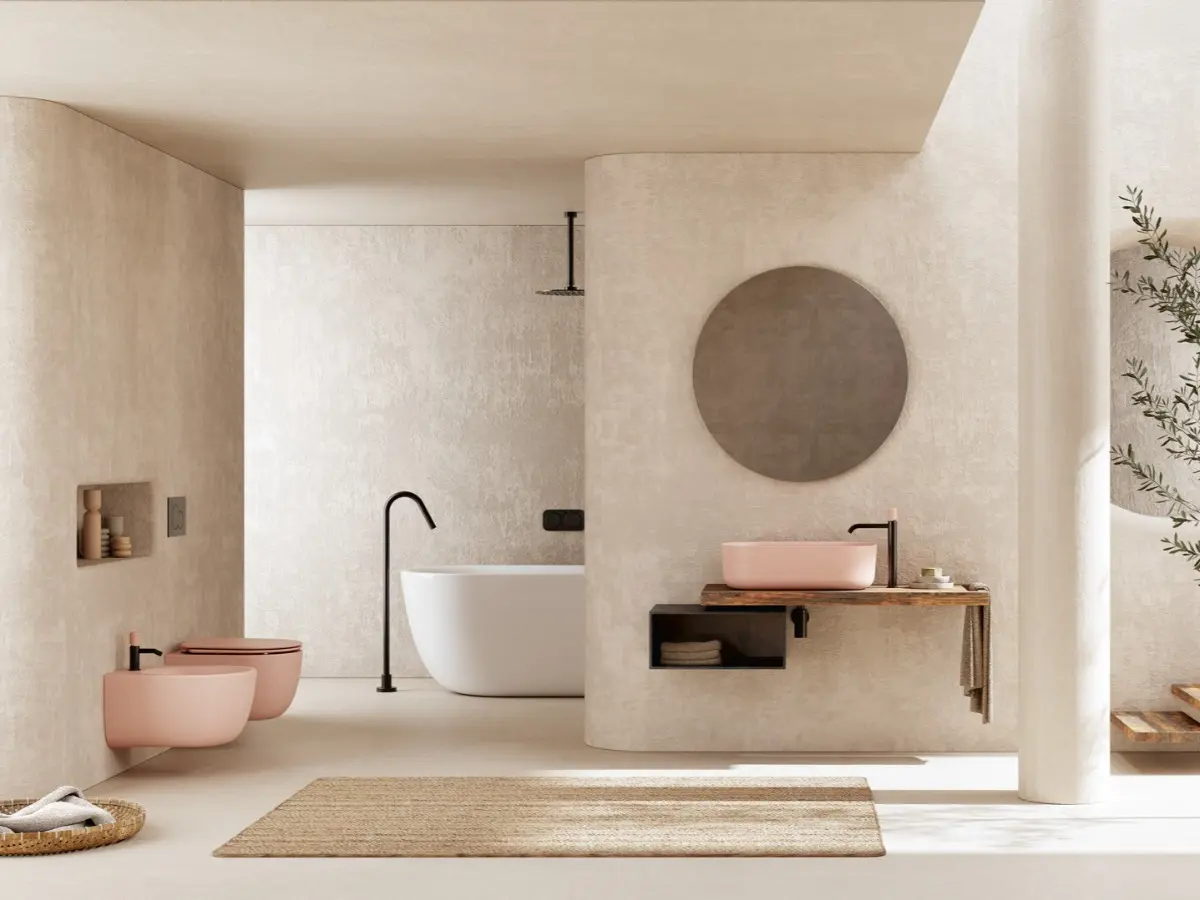 Ambiente Hit con sanitari sospesi e lavabo da appoggio finitura cipria satinato