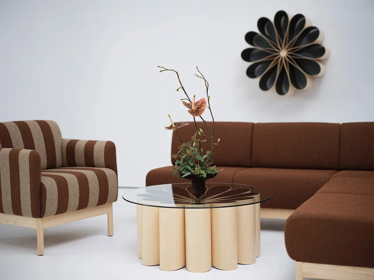 Soigne sofa armchair base in solid oak or ash. Upholstred in fabric or leather