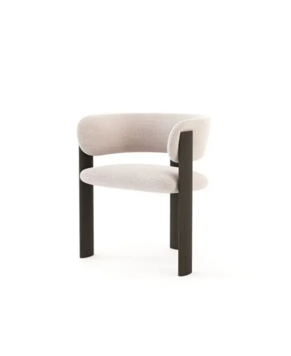The Dolomites Chair is shown as a sculptural upholstered chair in a light neutral fabric, featuring a curved seat and backrest supported by two tall vertical wooden legs that rise above the seat, creating a striking contrast between soft upholstery and strong linear wood elements.