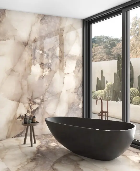 Modern bathroom with marble-effect walls and floor.