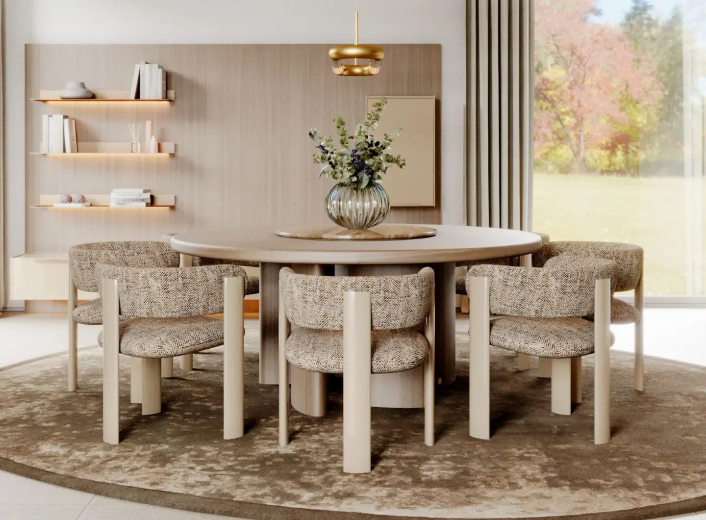 The Dolomites Round Dining Table is shown in a warm, contemporary dining room, surrounded by six upholstered chairs on a circular rug. A floral arrangement sits at the center of the table, with wooden shelves, soft integrated lighting, and large windows framing an inviting, serene atmosphere.