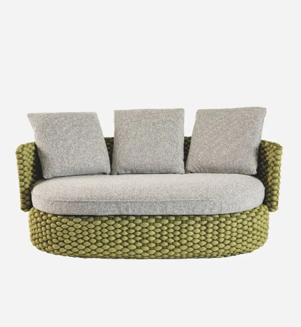 Two-seater sofa with Fine Grass rope structure and White/Green bouclé cushion.