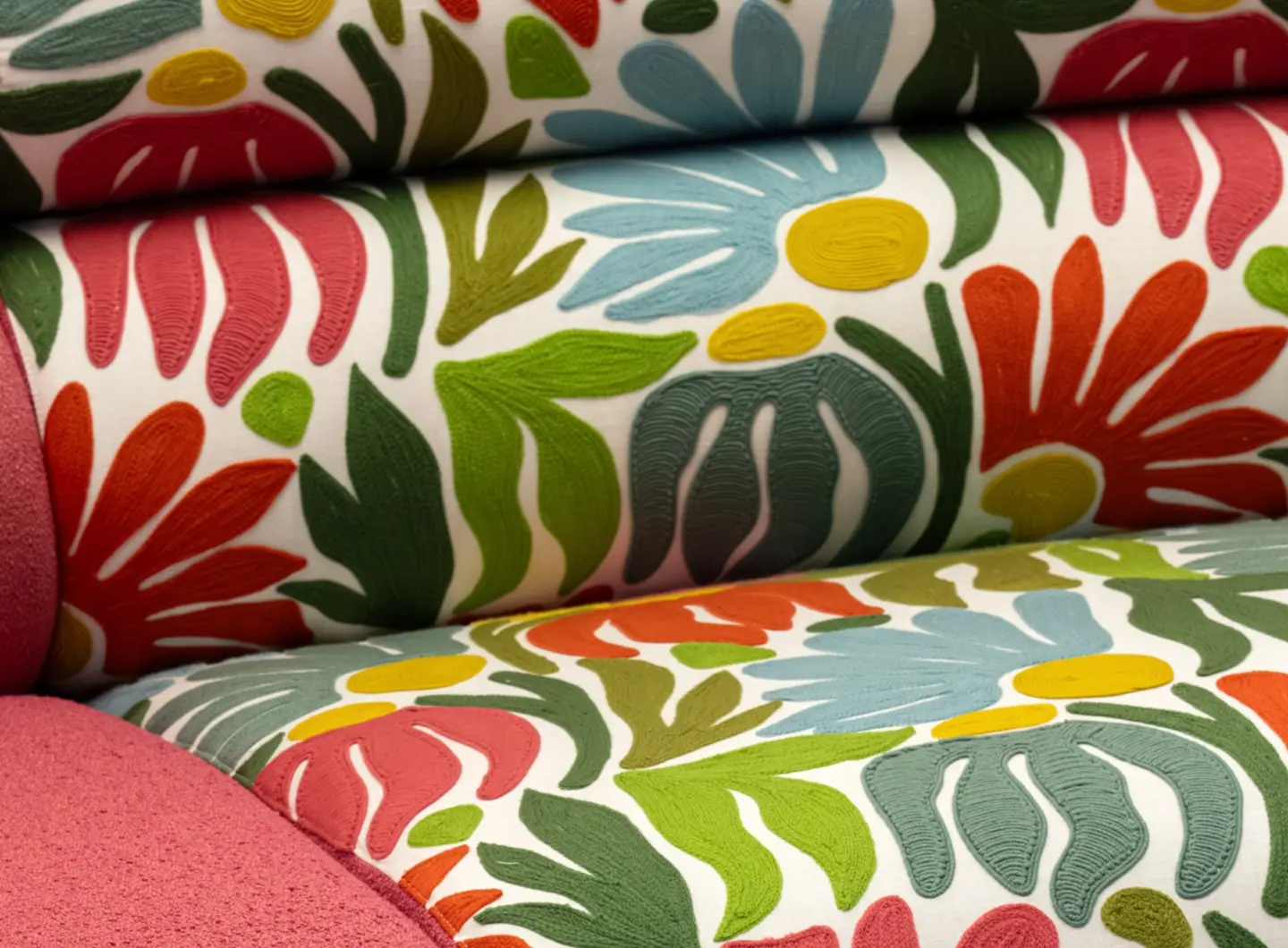 melody sofa in pink boucle with its round shapes and heart pillows