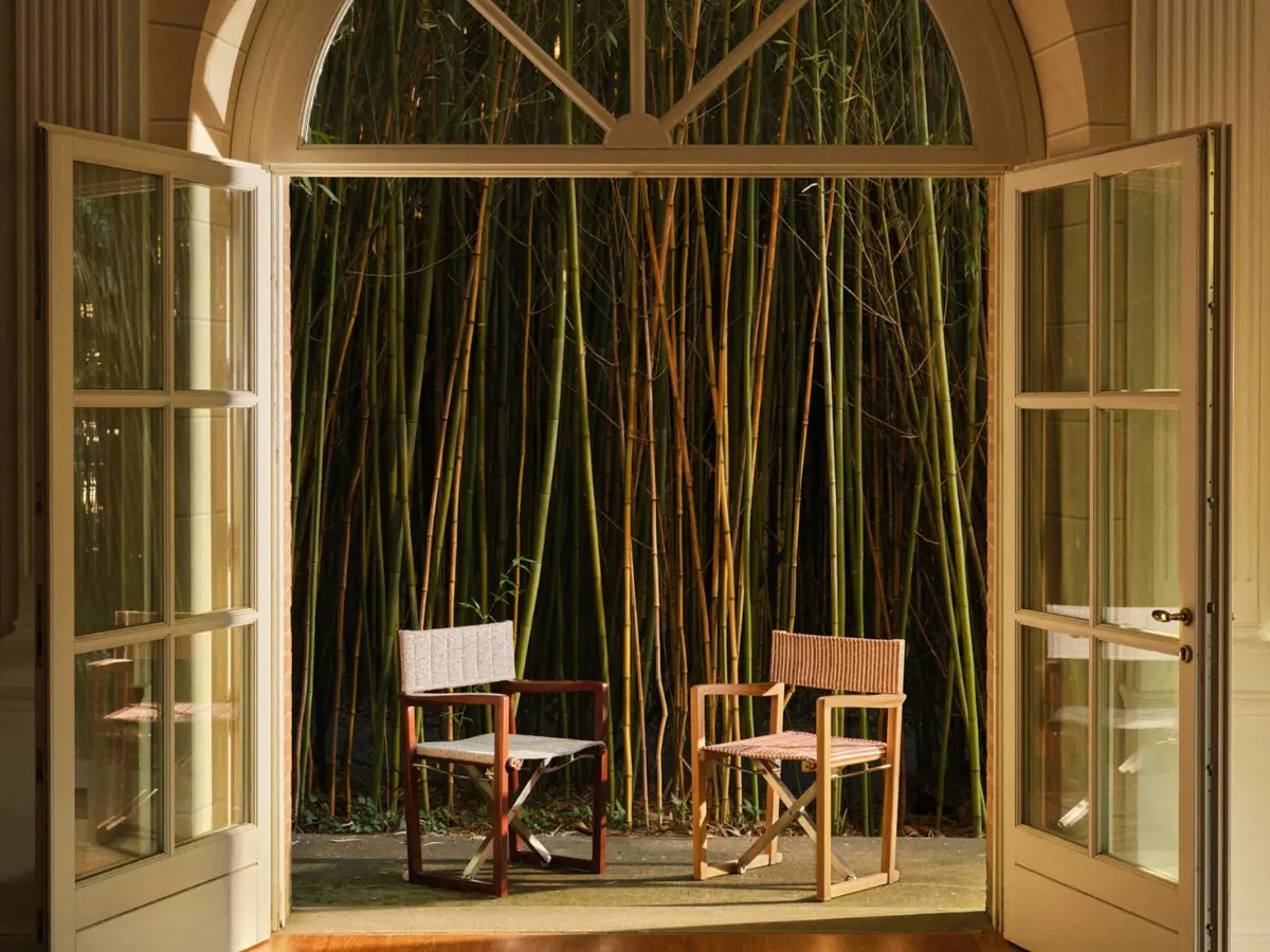 Sofia chairs in two colour variants, in an outdoor setting.