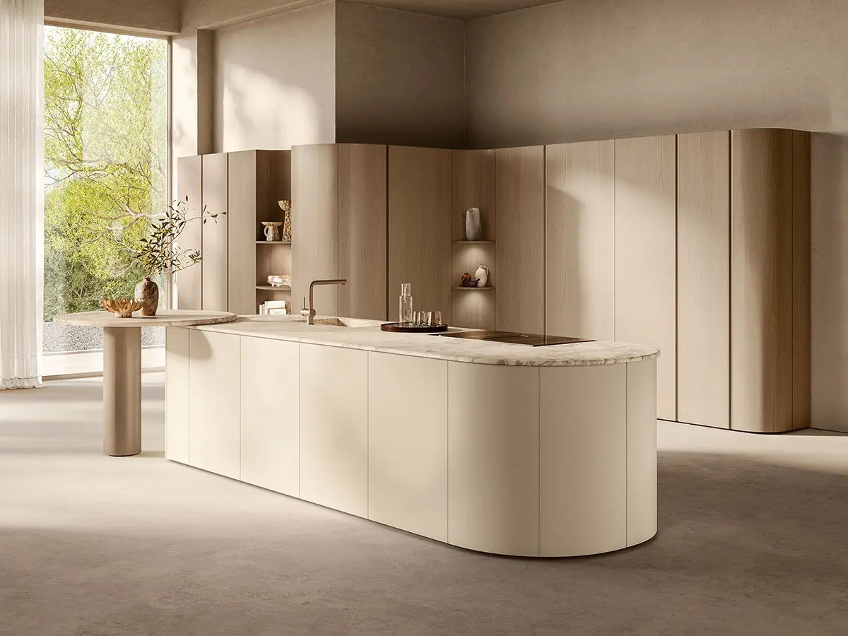 Flair Kitchen - Large island with matte lacquered Porcelain Cream doors and Vitium Technology countertop with custom Super Beige texture by Scavolini. Breakfast counter support and columns in Emmer Oak veneer.