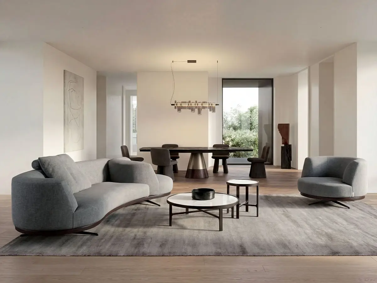 Sofa with integrated swivel armchair