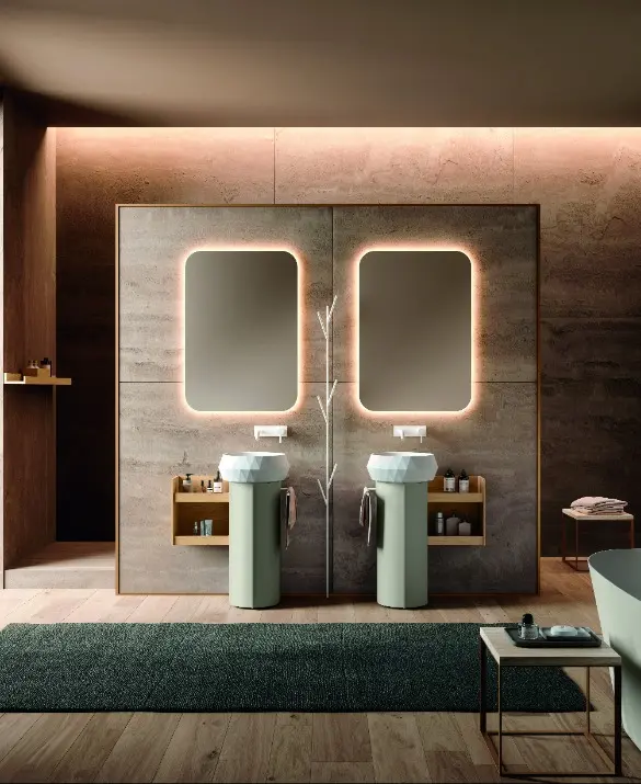 Calix UP. Floor-standing unit with round door in matt peltro lacquer. Open wall unit in Valdweg rovere HPL. Diamond countertop washbasin in white Teknorit. Round mirror with perimeter led lighting. Salus bathtub in solid surface. Tree-shaped towel holder in matt white lacquer.