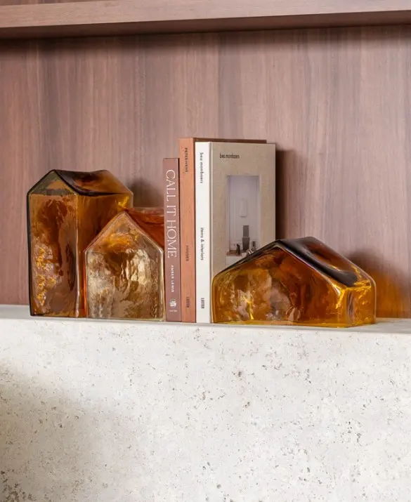 Mouth-blown glass sculpture from the Pagus collection by Studio Segers, shaped as a minimal rural building in warm tones.