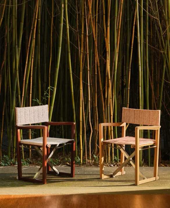 Sofia chairs in two colour variants, in an outdoor setting.