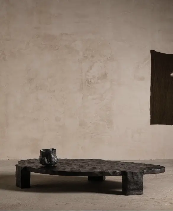 Hiku tea organic sculpt. Realised in hand-craved solid oak.