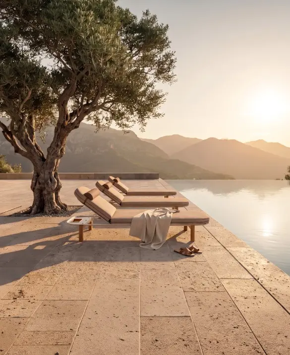 The Huma Sunbed combines a refined aluminum frame with teak wood legs and genuine leather details. Featuring three adjustable positions, it offers personalized comfort with a choice of wheels or a fixed base. Available in 20 aluminum finishes and three teak wood colors, it brings versatility and timeless elegance to outdoor spaces.
